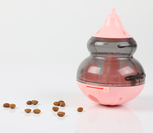 Dog leaking food ball toy